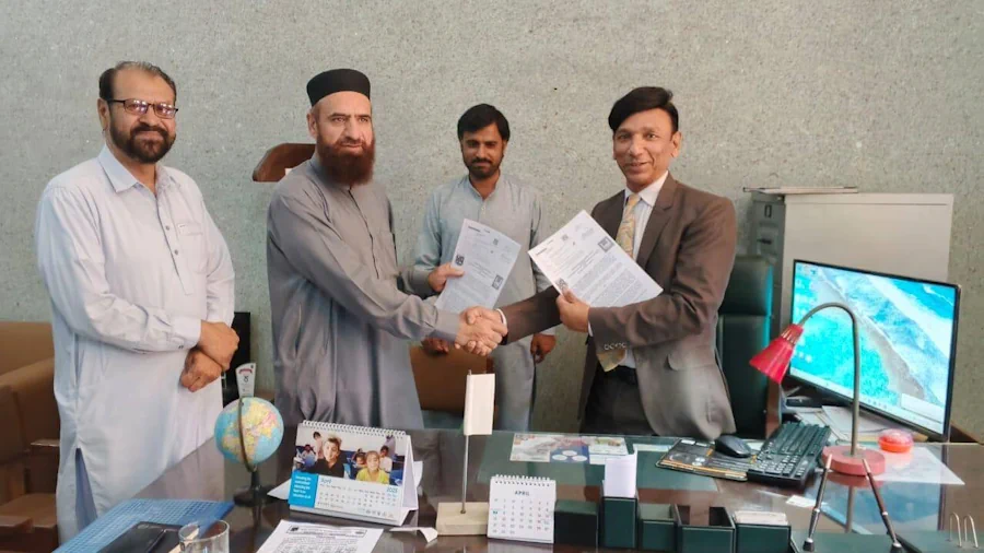 Principal GCT Rajanpur and IRP representative are shaking hands after signing MoU