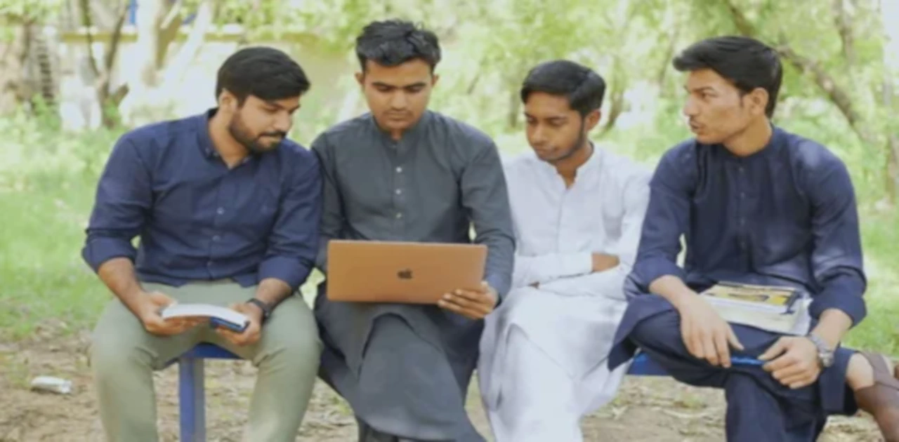 Students using wifi on their laptops