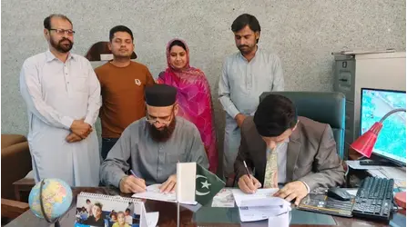 Principal GCT Rajanpur and provincial coordinator IRP are signing MoU
